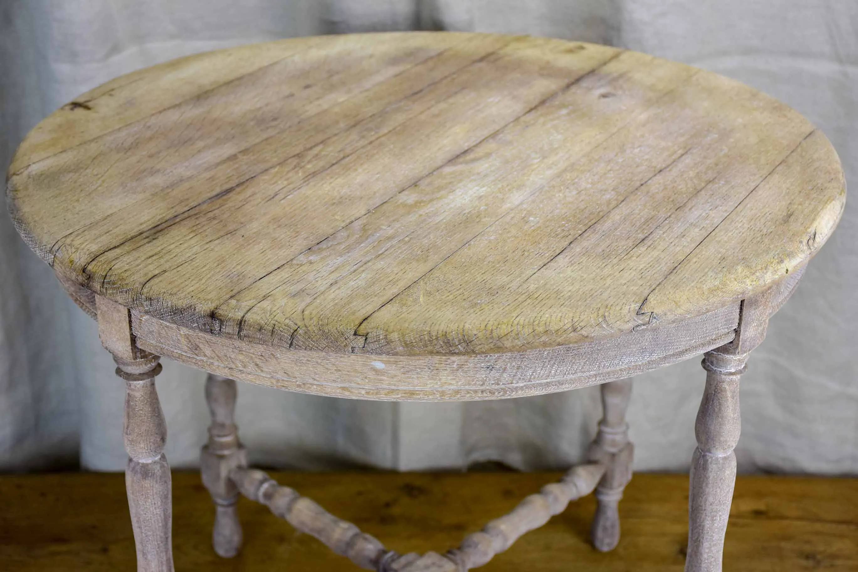 Antique French oak picnic table with four nested wedge chairs